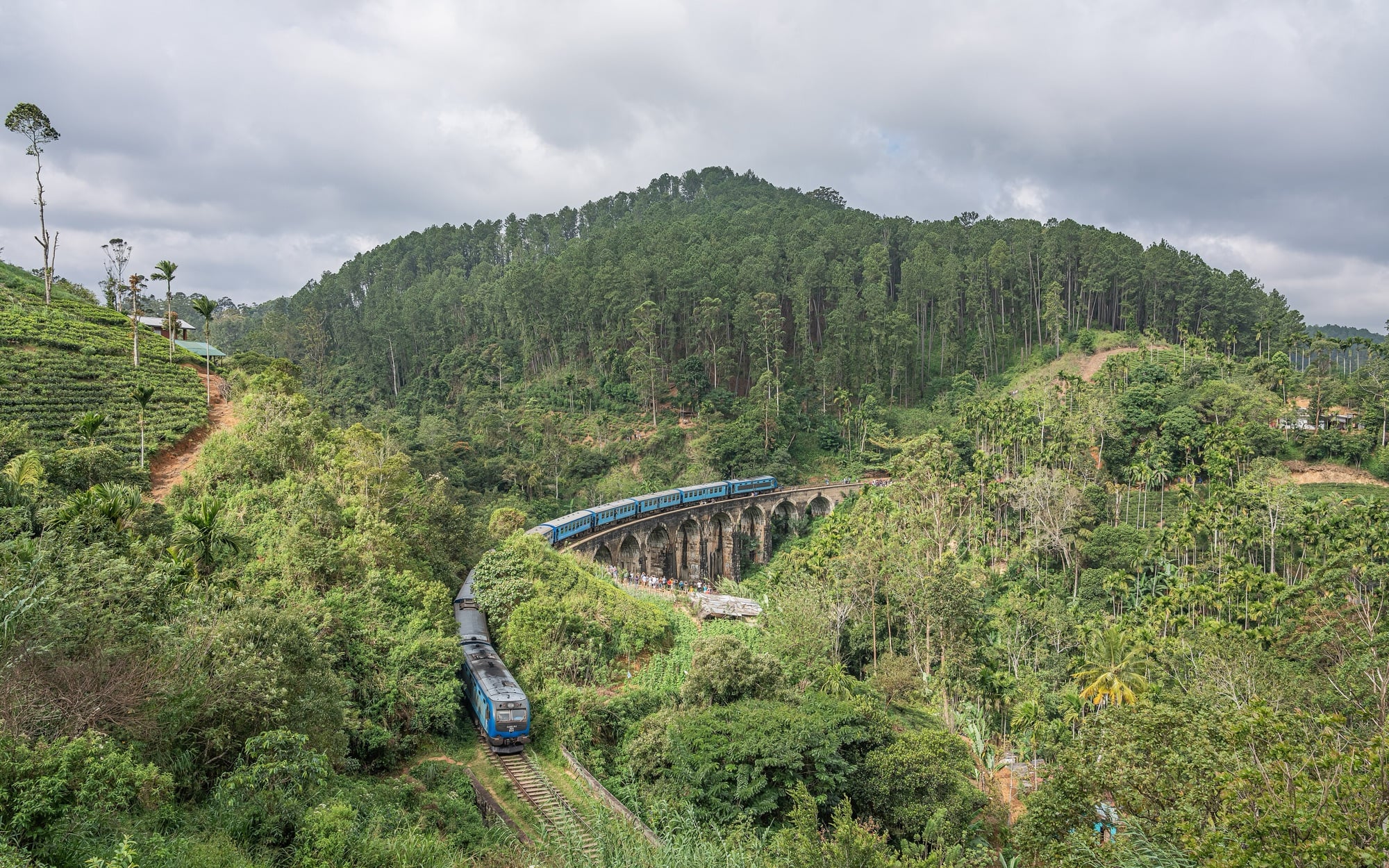 A train crossing the stone viaduct near Demodara on the Ella line